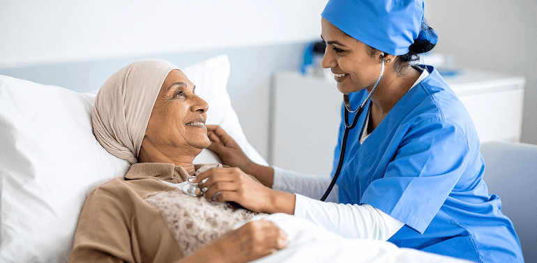 Nurse checking patient at home.